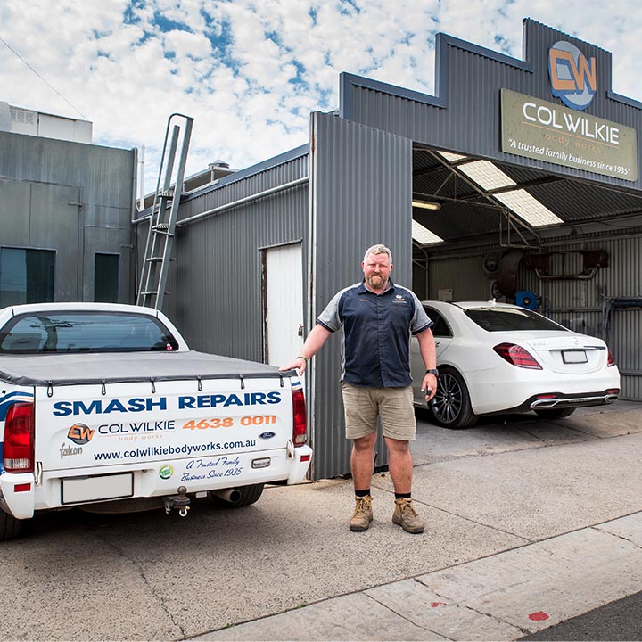 Steve in front of the Col Wilkie Body Works workshop